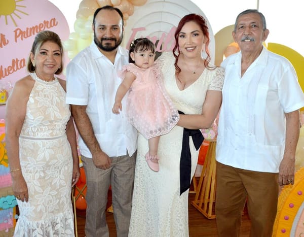 EMILIA RECIBE EL SACRAMENTO DEL BAUTISMO